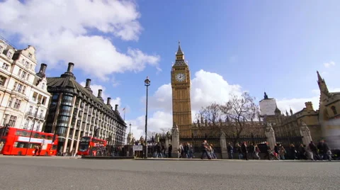 Big Ben and Traffic streaming past Houses of Parliament, London - Stock Footage 40263635