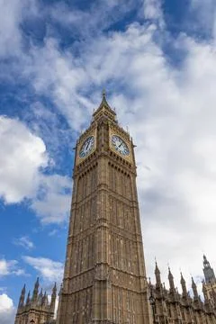 Big Ben clock tower against blue sky in London Stock Photos