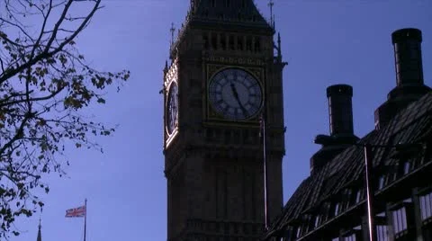 Big Ben with waving Union Jack Flags 库存影片 10569238