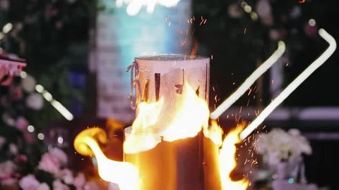 The big birthday cake is burning according to the cook's idea Stock Footage 302111508