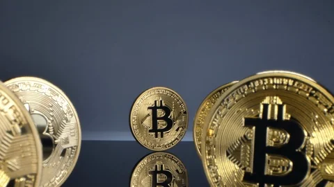 Big bitcoins lined up, slow motion, macro Stock Footage 126558532