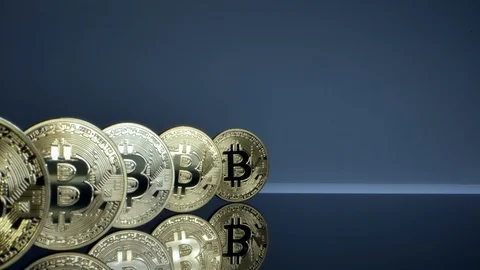 Big bitcoins lined up, slow motion, macro Stock Footage 126558829