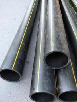 Big black pipe closeup plastic large diameter Stock Photos