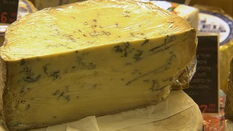 Big block of cheese with molds Stock Footage 87764713