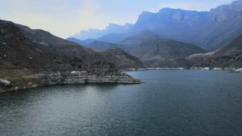Big blue lake in the mountains Stock Footage 171295794