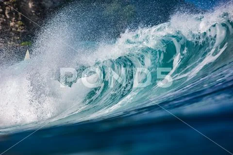 Big blue ocean powerful wave closeup view from water level extreme photo Stock Photos