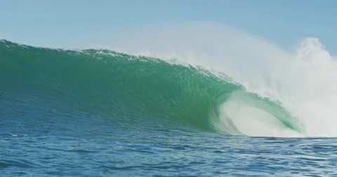 Big Blue Ocean Wave Breaking in Slow Motion 4K in dangerous shallow water Stock Footage 81600778