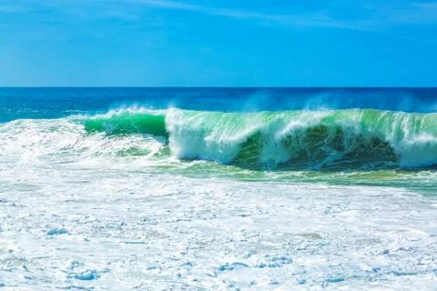 Big blue ocean waves with white foam Stock Photos