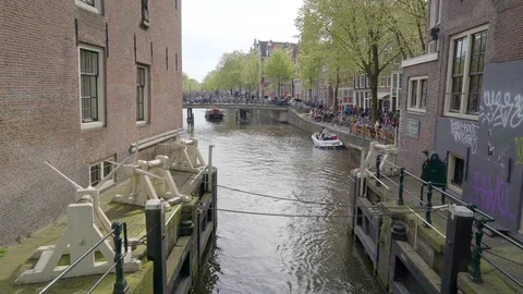 The big boat cruising the canal in Amsterdam Stock Footage