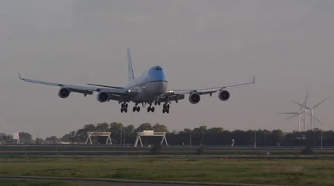 Big Boeing 747 'Jumbo' touchdown at the runway very early morning Stock Footage 40191998