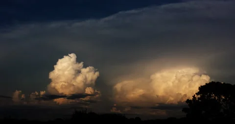 Big Boiling Dusk Clouds (2k 23.976) Stock Footage 133418994