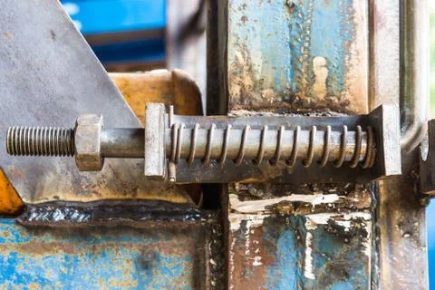 Big bolt and nut is a sugar cane harvest. Stock Photos