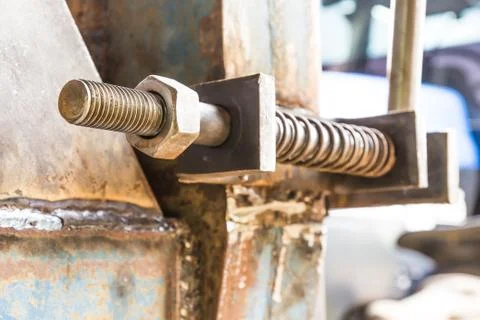 Big bolt and nut is a sugar cane harvest. Stock Photos