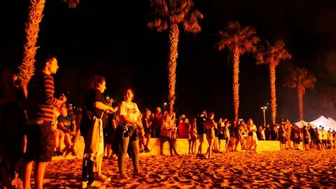 Big bonfire on the beach at night in honor of the fireworks festival Stock Footage 112262841