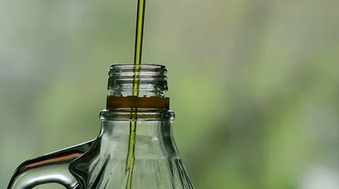Big Bottle with Extra Virgin Olive Oil Stock Footage 61251323
