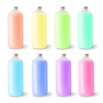 Big bottles on the white background. Stock Photos