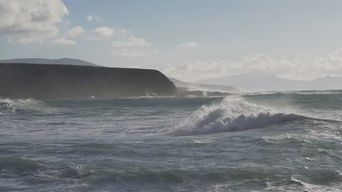 Big breakers in the Atlantic Ocean and a rock in Ayuy Video stock 102557650