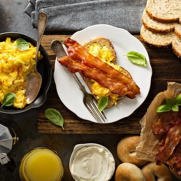 Big breakfast with bacon and scrambled eggs Stock Photos