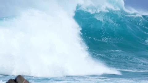 Big breaking Ocean wave Huge Rolling waves hits Hard on Shallow Reef stormy. Stock-Footage 336585763