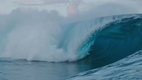 Big breaking Ocean wave Huge Rolling waves hits Hard on Shallow Reef stormy. Video stock 336585944