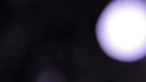 Big bright flashing light on the left in the darkness Vidéo 317478027