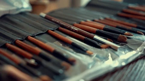Big brush set for make-up lying on the table Video stock 69987363