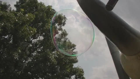 Big Bubble Floats Through Air Video stock 205580470