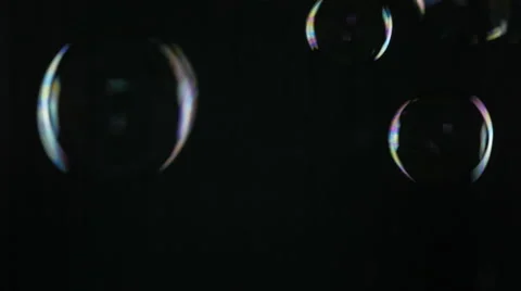 Big Bubble flying on a black background Видео 64051221