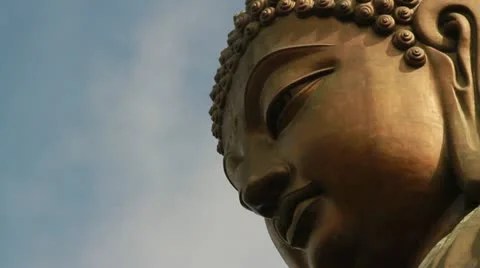 Big Buddha Extreme Close Up with clouds background 스톡 동영상 12354547