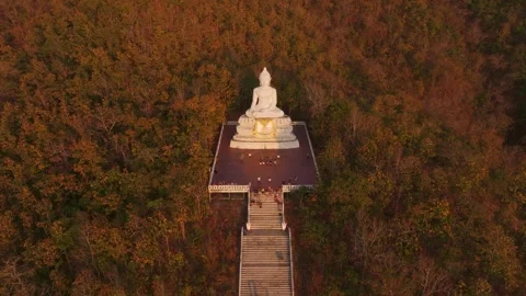 Big Buddha Pai from the sky, surrounded by vibrant nature Stock Footage 302192343