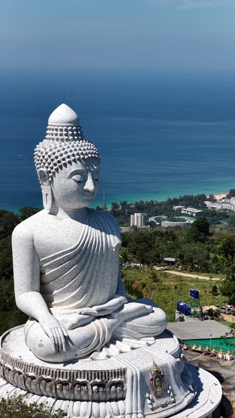 Big Buddha of Phuket overlooking tropical coastline and Andaman Sea Stock Footage 345267762