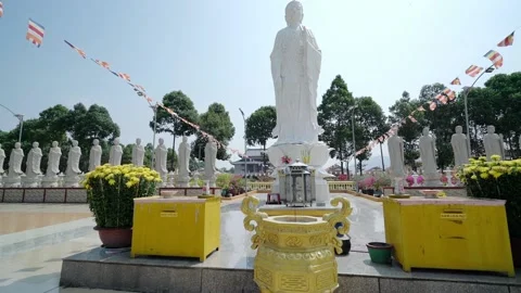 Big Buddha statue and 49 small statue before temple courtyard, Stock Footage 156322995