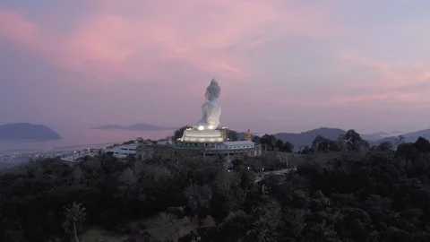 Big Buddha statue on the hill in Phuket Island Sunset 4K Drone flight Stock Footage 119733360
