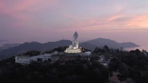 Big Buddha statue on the hill in Phuket Island Sunset 4K Drone flight Stock Footage 119733752