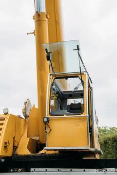 Big building crane on construction site Stock Photos