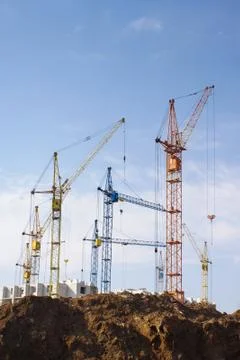 Big building with cranes Stock Photos