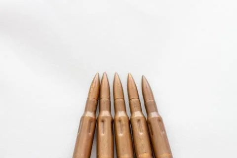 Big bullets for machine gun on white background Stock Photos