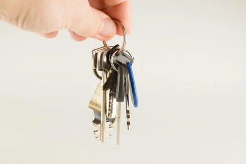 Big bunch of different keys in hand Stock Photos