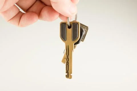 Big bunch of different keys in hand Stock Photos