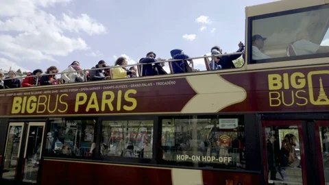 Big Bus Paris double-decker tourism panning to Arc de Triomphe in France 1080 Stock Footage 93812286