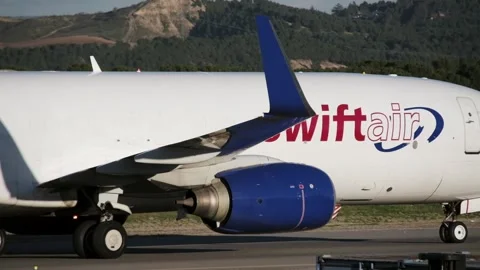 Big cargo Boeing 737-8FE aircraft of Swiftair Airlines Stock Footage 330519670