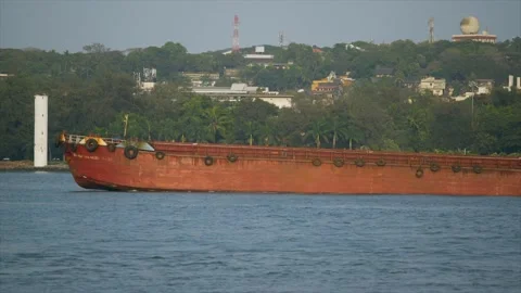 Big cargo ship crossing in goa port Stock Footage 216520963