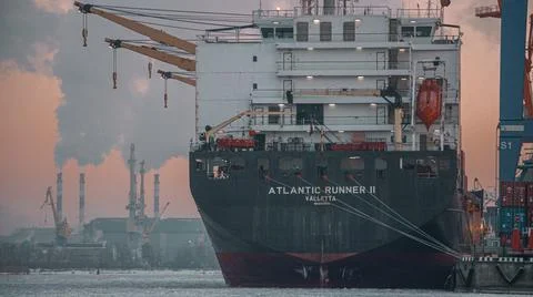 Big cargo ship in the port Stock Photos