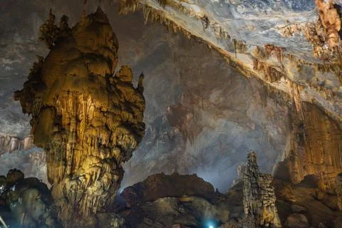 Big cave and stalactite looking like a sculupture in Paradise Cave in Phong.. Stock Photos