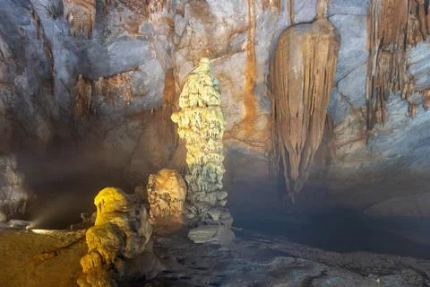 Big cave and stalactite looking like a sculupture in Paradise Cave in Phong.. Stock Photos