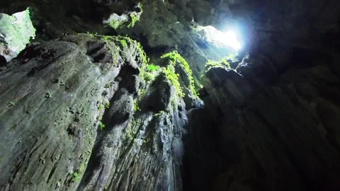 Big caves with small rain or waterfall drop. Fairy caves, sarawak, kuching,.. Stock Footage 293774810