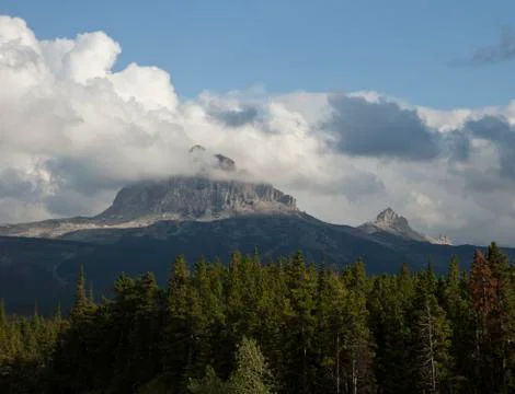 Big chief mountain in clouds Stock Photos