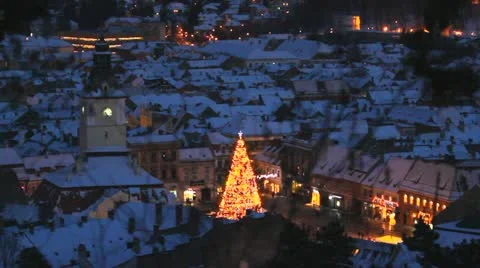 Big Christmas tree lighting the night in the city center Stock Footage 20557158