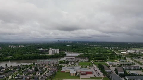 A big city surrended with rainy clouds above  over it Stock Footage 338224944