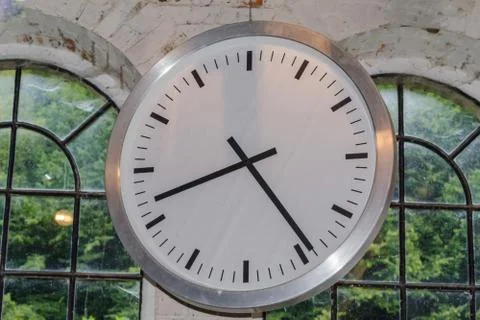 Big clock in a factory Stock Photos
